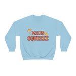 blue crewneck sweatshirt with a graphic that says "main squeeze" in orang font with graphics of orange slices