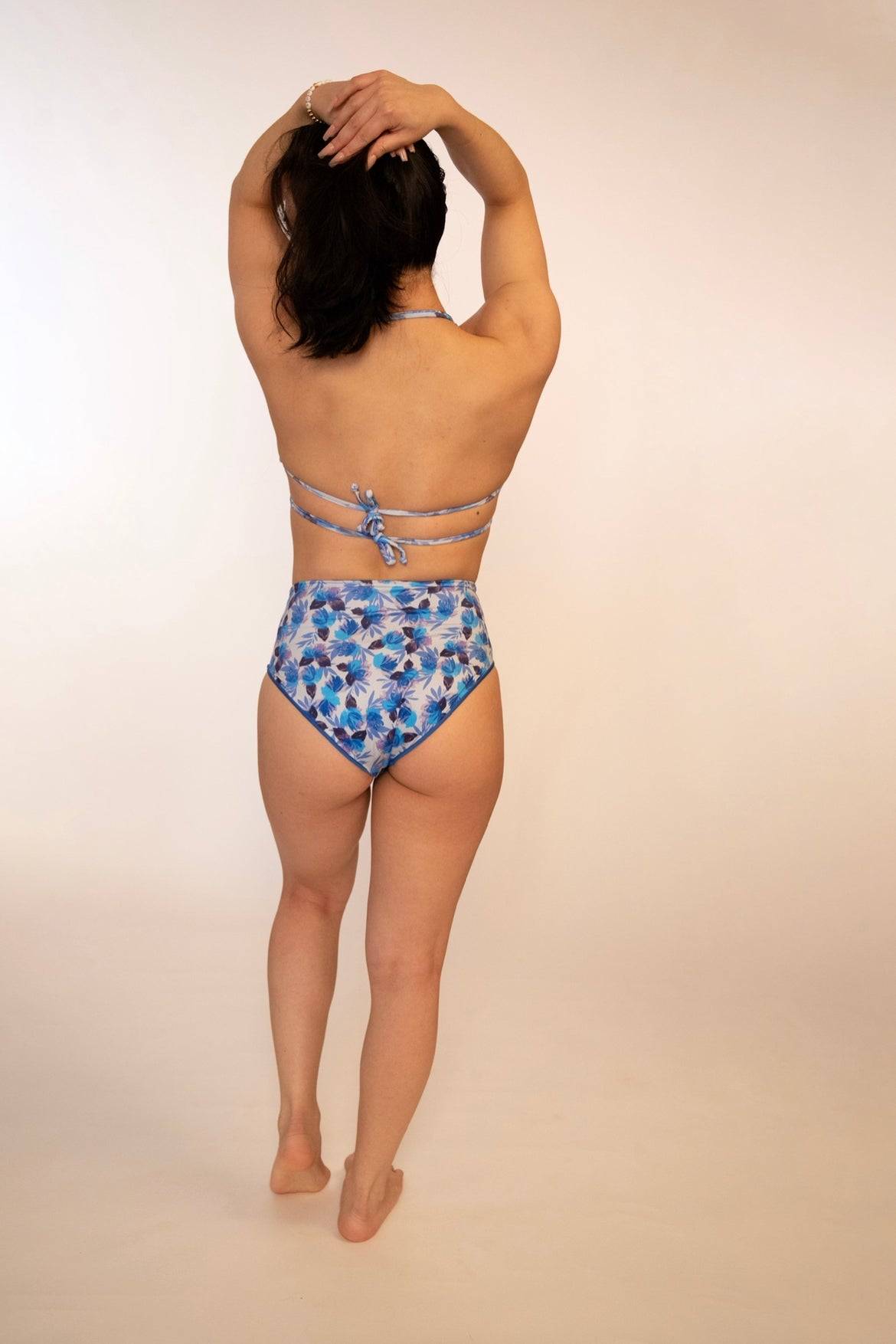Blue floral bikini top double tied in back with mid coverage high waisted bikini bottoms