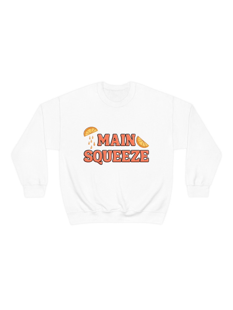white crewneck sweatshirt with a graphic that says "main squeeze" in orang font with graphics of orange slices