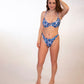 woman in blue floral underwire bikini top and matching high hip thong bottoms